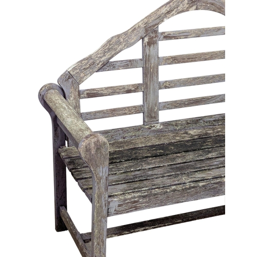 1051 - A Georgian style teak garden bench. 133cm(4)