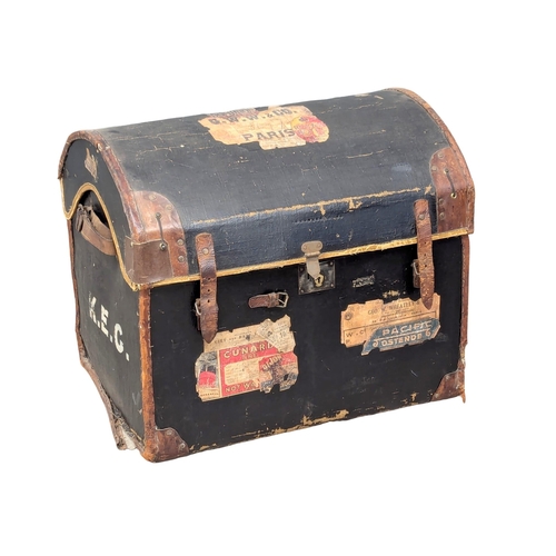 253 - A Late 19th Century dome topped trunk with original shipping labels and interior. Cunard Line, Railw... 