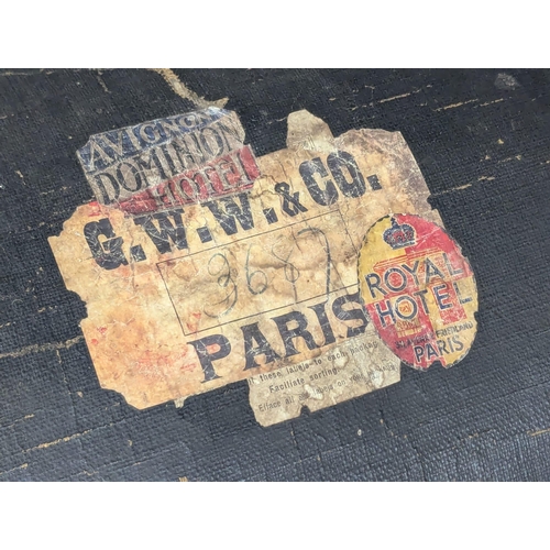 253 - A Late 19th Century dome topped trunk with original shipping labels and interior. Cunard Line, Railw... 