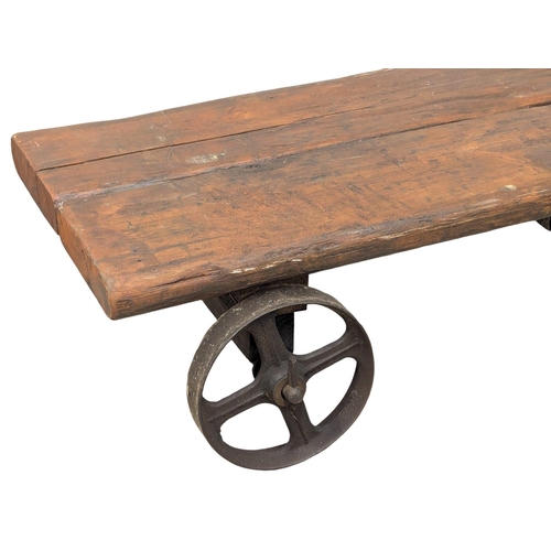 830 - A Victorian foundry trolley converted to coffee table. 127x53x37cm (10)