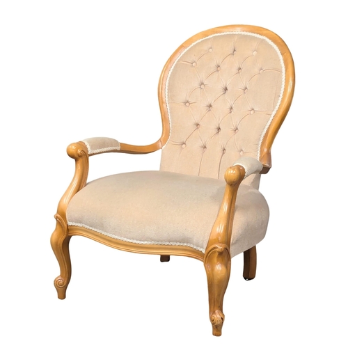 835 - A pair of Victorian style spoonback armchairs on Cabriole legs. (1)