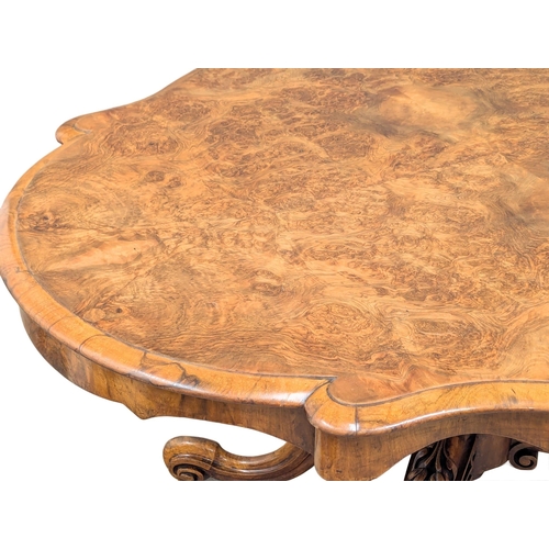 850 - A Victorian Burr Elm tilt top pedestal breakfast table / dining table on Cabriole legs. Circa 1860-1... 