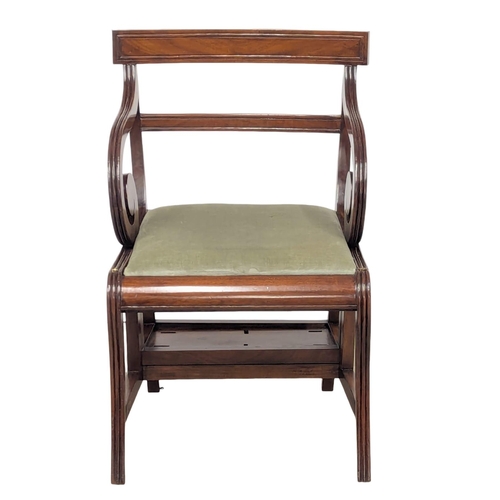 852 - A large Regency style mahogany metamorphic chair. (2)