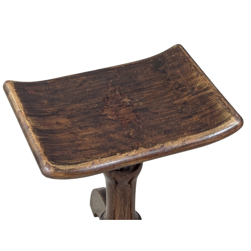 859 - A Late 19th Century / Early 20th Century mahogany revolving stool. (2)