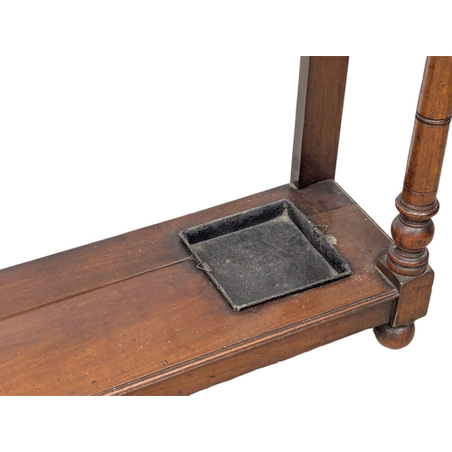 867 - A Late Victorian walnut hall stand. Circa 1890s. 97.5x29x211cm(11)