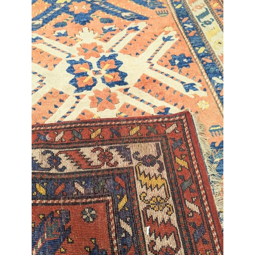 872 - A vintage Middle Eastern hand knotted rug. 123x205cm