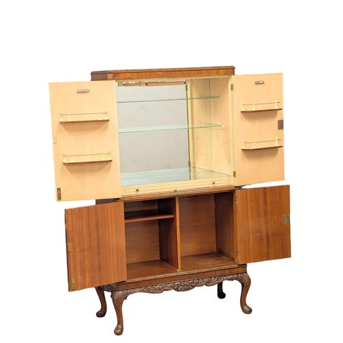 874 - A vintage Georgian style mahogany cocktail cabinet with maple interior. 94x45x162.5cm(10)