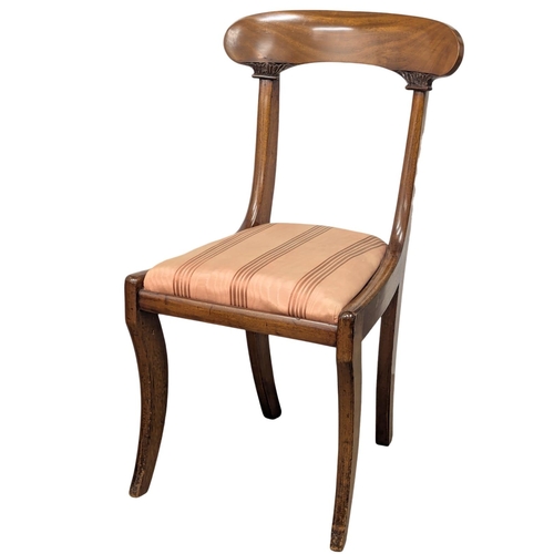 877 - A set of 6 Late George IV / William IV mahogany bar back dining chairs on sabre legs. Circa 1825-183... 