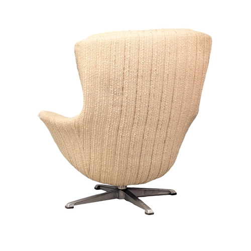 878 - A 1970s Mid Century swivel egg chair.(10)