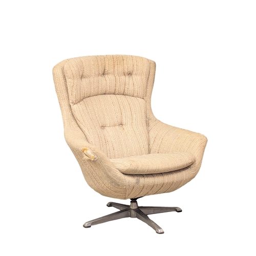 878 - A 1970s Mid Century swivel egg chair.(10)