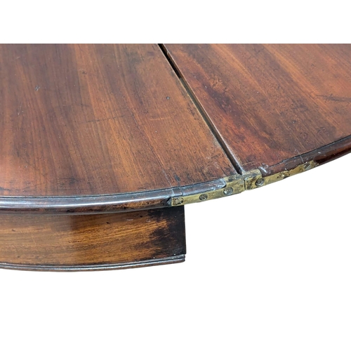 894 - A George III mahogany demi-lune tea table. 93x46x74cm (5)