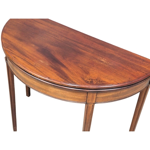 894 - A George III mahogany demi-lune tea table. 93x46x74cm (5)