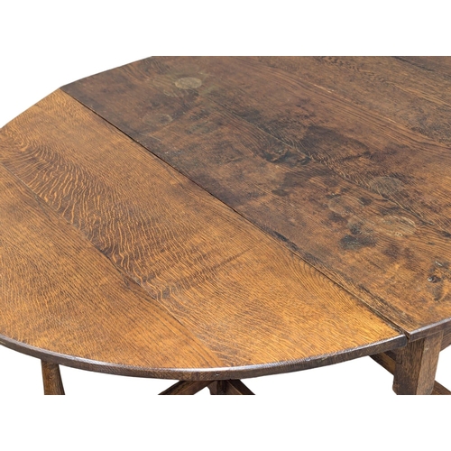 909 - A late 19th century  Georgian style oak  dropleaf table. Circa 1800. 162x123x73cm extended(1)