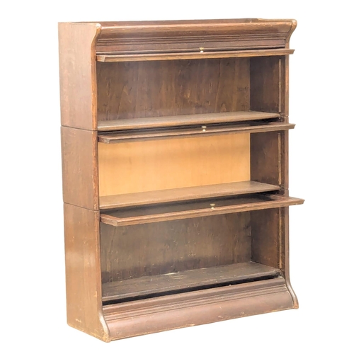 910 - An Early 20th Century oak stacking bookcase. Circa 1900-1910. 87x30x113.5cm(4)