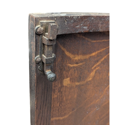 912 - A Late 18th Century George III oak wall hanging corner cupboard with fitted shelves. 65x46x107cm(7)