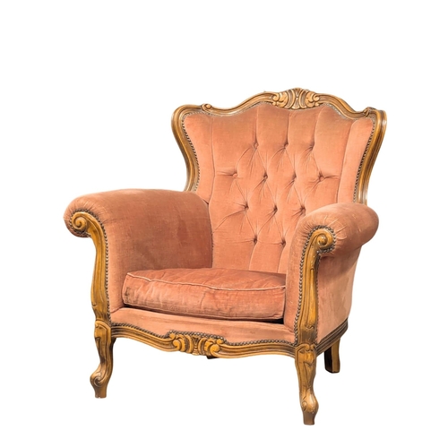 914 - A pair of French style armchairs.(9)