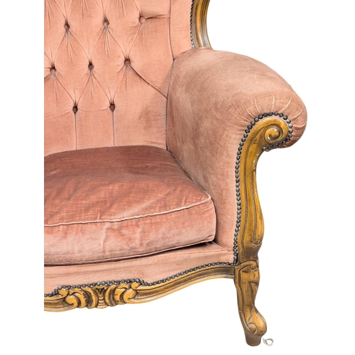 914 - A pair of French style armchairs.(9)