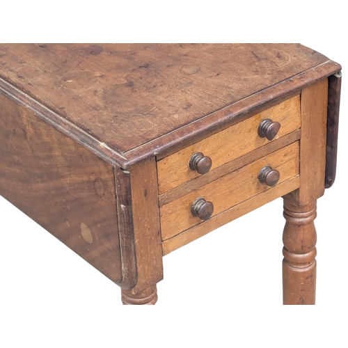 956 - A small Victorian mahogany Pembroke table with two drawers and two dummy drawers. 72x49x66cm(1)