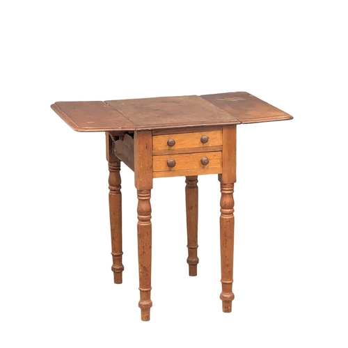 956 - A small Victorian mahogany Pembroke table with two drawers and two dummy drawers. 72x49x66cm(1)