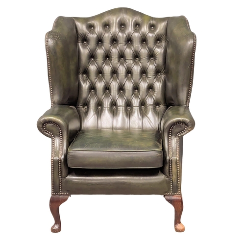 957A - A leather wingback armchair (5)