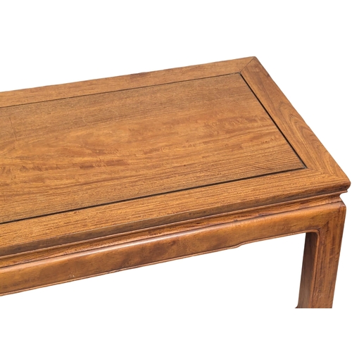 958 - A Chinese teak coffee table. 122x48x41cm(9)