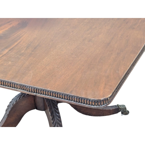 991 - A large Late George IV Early 19th Century mahogany pedestal tilt top breakfast table / dining table.... 