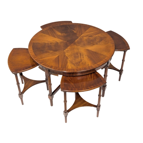 992 - A large mahogany nest of tables. 76x49cm (10)