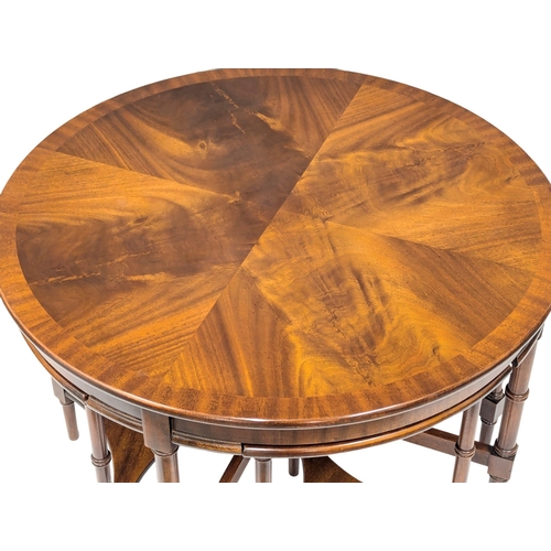 992 - A large mahogany nest of tables. 76x49cm (10)