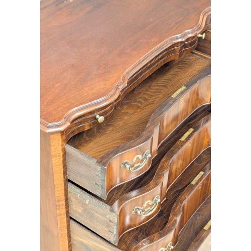 996 - A 1930s Georgian style Serpentine front mahogany bachelors chest with brushing slide. 76x47x82cm (4)