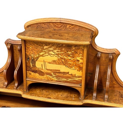 803 - Émile Gallé. A “Forêt Lorraine” bonheur du jour/desk. Inlaid with tigerwood, burr walnut, rosewood, ... 