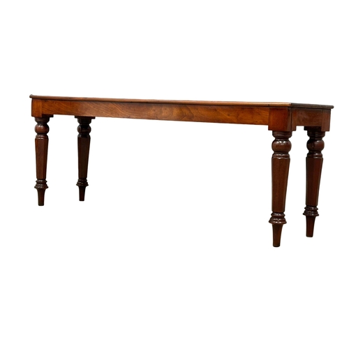 811 - A long Mid Victorian mahogany bench/stool. Circa 1860-1870. 111x30x43cm (8)