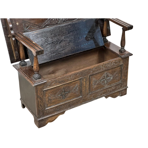 856 - A Victorian oak turnover monks bench. Combination side table, with lift up storage. 19th Century. Ci... 