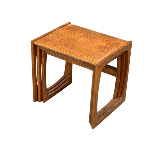 861 - A G-Plan “Quadrille” Mid Century teak nest of tables. Designed by Roger Bennett.