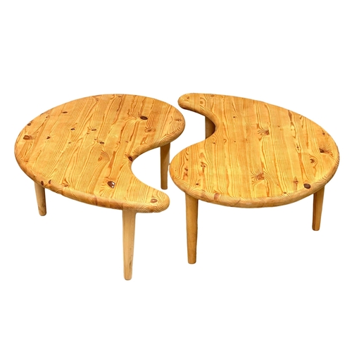 862 - A pair of Mid Century pine boomerang tables. 96x59x34.5cm each. 105x34.5cm together.(11)