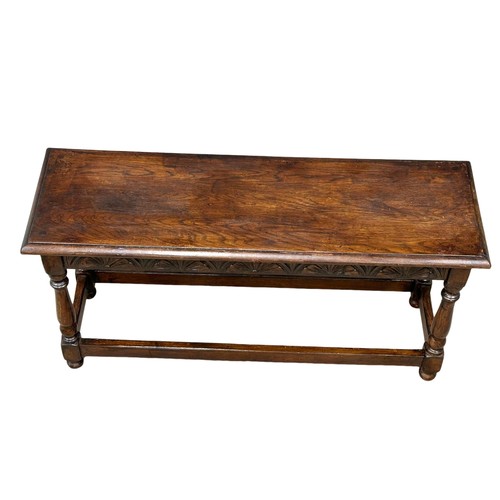 831 - A Mid 20th Century oak joint window bench/stool. In the 17th Century style. 91x30x46cm(9)