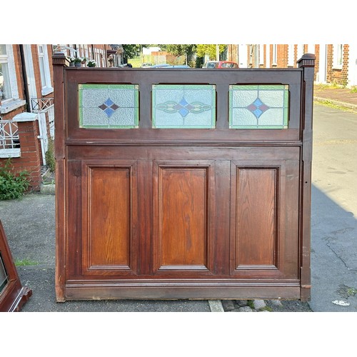 815A - A very large mahogany framed double sided panel with 3 stained glass windows. 194x187cm