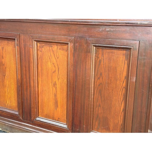 815A - A very large mahogany framed double sided panel with 3 stained glass windows. 194x187cm