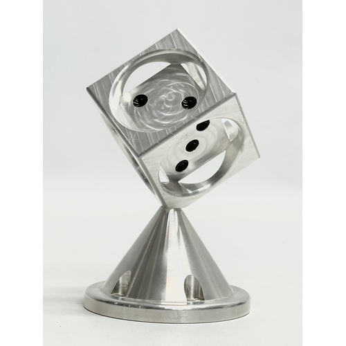 624 - A chrome dice sculpture paperweight. 13cm