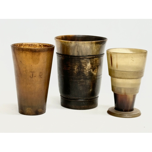 355 - Three 19th Century horn beakers. Including a later plastic collapsible beaker.