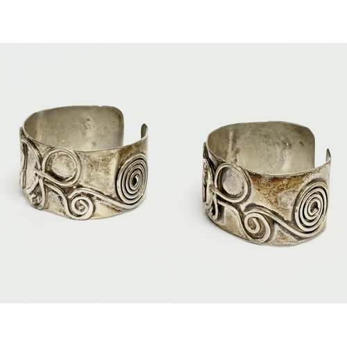 751 - A pair of Early 20th Century cuff bracelets. 5x4.5cm