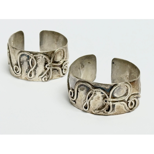 751 - A pair of Early 20th Century cuff bracelets. 5x4.5cm