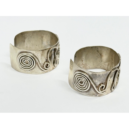 751 - A pair of Early 20th Century cuff bracelets. 5x4.5cm