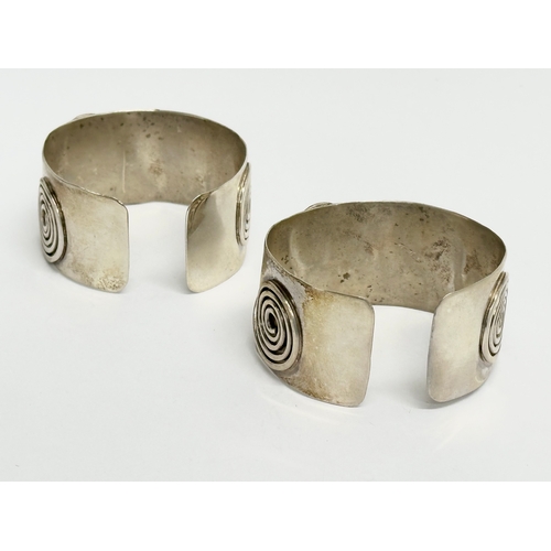 751 - A pair of Early 20th Century cuff bracelets. 5x4.5cm