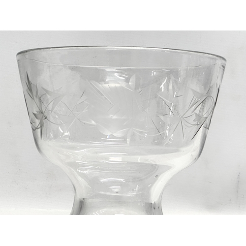 300B - A large signed footed bowl with etched flowers and vines. Dated 1981. 19.5x18.5cm.