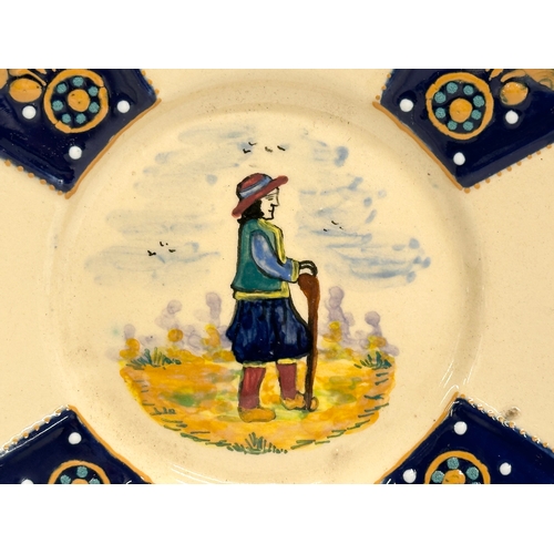 300D - A Late 19th Century HB Quimper pottery plate. France. Henriot Quimper. Circa 1890. 15.5x15.5cm