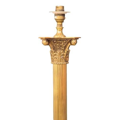 951 - A vintage brass standard lamp with Corinthian style column on lion paw feet. 132cm (5)