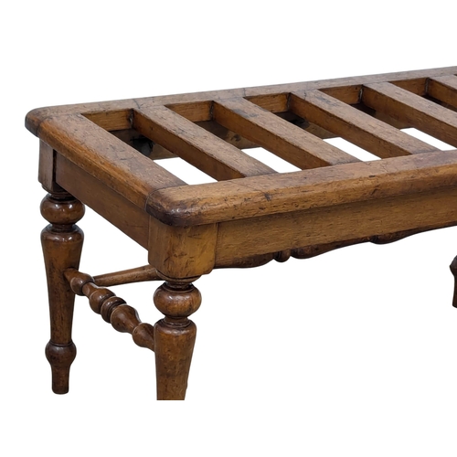 1044 - A Late 19th Century luggage rack on turned legs. 84x41x41cm(8)