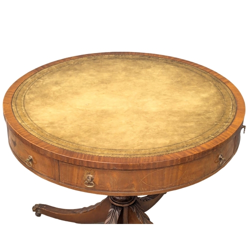 922A - A George IV style mahogany drum table/centre table. With quality leather top.  81.5x71cm(11)