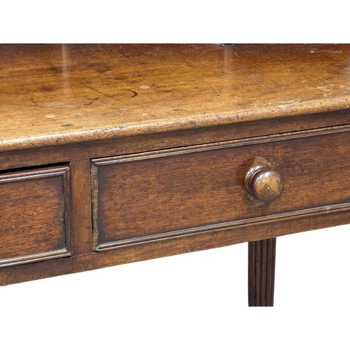 979A - A George IV mahogany writing table in the manner of Gillows. Circa 1825-1830. 94x47.5x90.5cm 1