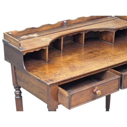 979A - A George IV mahogany writing table in the manner of Gillows. Circa 1825-1830. 94x47.5x90.5cm 1